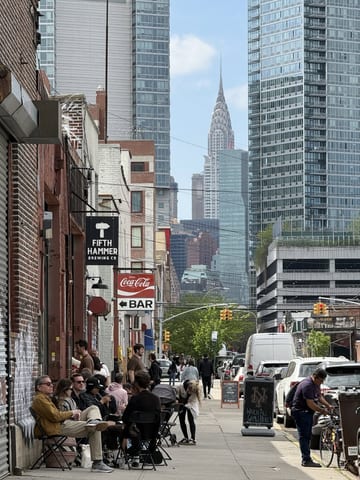 Long Island City street looking toward the Chrysler Building in Manhattan